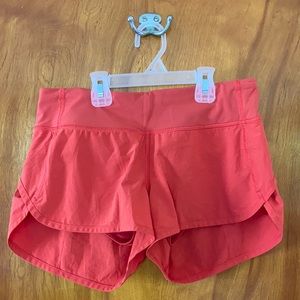 Red lululemon speed up shorts 2.5”